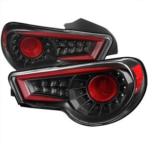 SK-Import Tail Lights With Sequential Turn Signal Lights Black Housing Clear Lens Toyota, Subaru