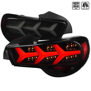 SK-Import Tail Lights With Sequential Turn Signal Lights Gloss Black Housing Smoke Lens Toyota, Subaru Pre Facelift